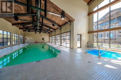 570 Sarsons Road Unit# 8, Kelowna, BC - Indoor Photo Showing Other Room With In Ground Pool