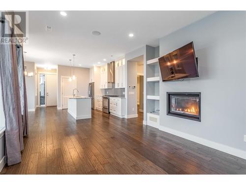 1288 Steele Road, Kelowna, BC - Indoor Photo Showing Living Room With Fireplace