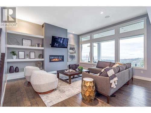 1288 Steele Road, Kelowna, BC - Indoor Photo Showing Living Room With Fireplace