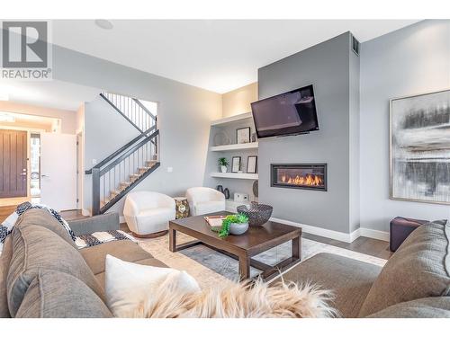 1288 Steele Road, Kelowna, BC - Indoor Photo Showing Living Room With Fireplace