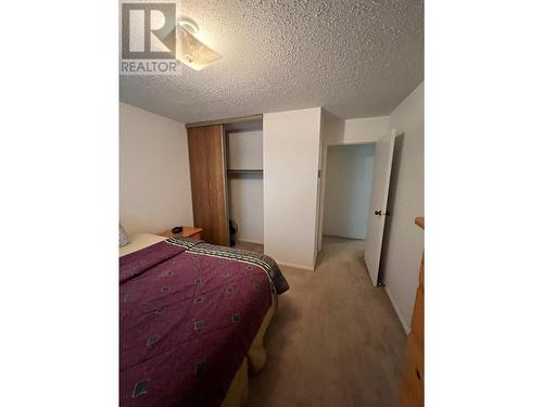 216 Spieker Avenue Unit# 204, Tumbler Ridge, BC - Indoor Photo Showing Bedroom