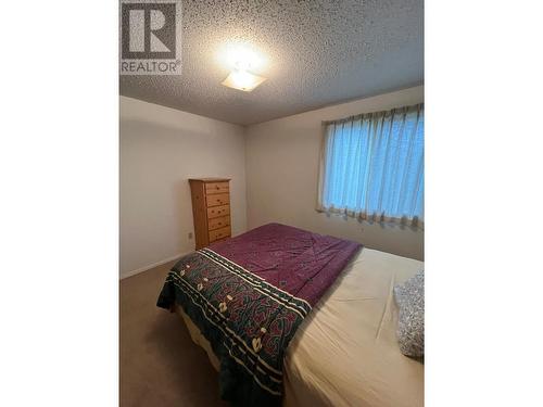 216 Spieker Avenue Unit# 204, Tumbler Ridge, BC - Indoor Photo Showing Bedroom