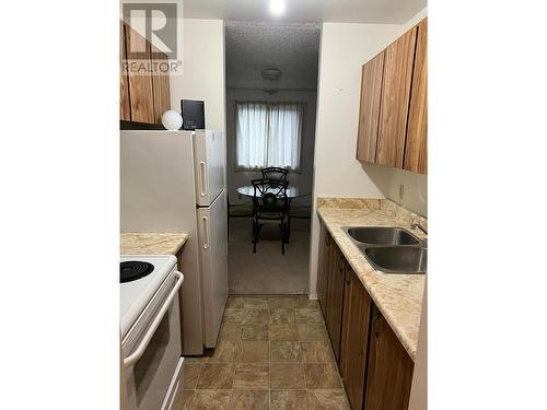 216 Spieker Avenue Unit# 204, Tumbler Ridge, BC - Indoor Photo Showing Kitchen With Double Sink