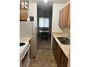 216 Spieker Avenue Unit# 204, Tumbler Ridge, BC  - Indoor Photo Showing Kitchen With Double Sink 