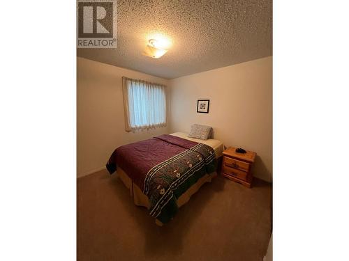 216 Spieker Avenue Unit# 204, Tumbler Ridge, BC - Indoor Photo Showing Bedroom