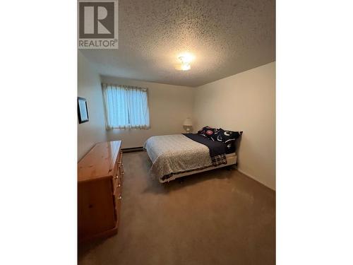 216 Spieker Avenue Unit# 204, Tumbler Ridge, BC - Indoor Photo Showing Bedroom