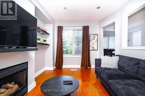 5380 Floral Hill Crescent, Mississauga, ON - Indoor Photo Showing Living Room With Fireplace