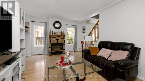 42 Caruso Drive, Brampton, ON - Indoor Photo Showing Living Room With Fireplace