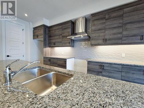 9 - 32 Faith Street N, Cambridge, ON - Indoor Photo Showing Kitchen With Double Sink