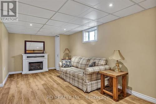 506 Cedar Glen Road, Kawartha Lakes, ON - Indoor With Fireplace