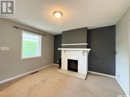 230 Main Street, Earl Grey, SK - Indoor With Fireplace