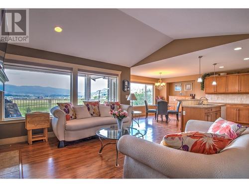 6472 Agassiz Road, Vernon, BC - Indoor Photo Showing Living Room With Fireplace