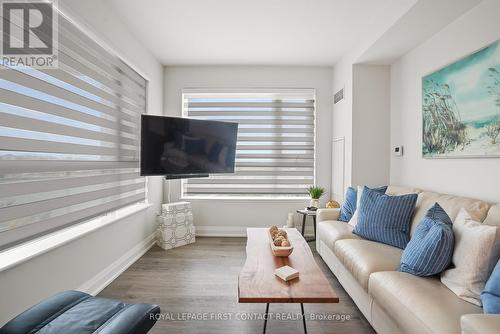 917 - 58 Lakeside Terrace, Barrie (Little Lake), ON - Indoor Photo Showing Living Room