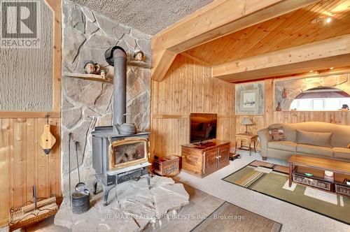 12435 Loyalist Parkway, Prince Edward County, ON - Indoor Photo Showing Living Room With Fireplace