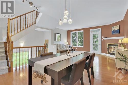 35 Briarway Private, Ottawa, ON - Indoor Photo Showing Dining Room With Fireplace