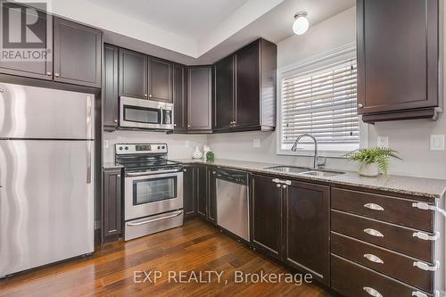 12 Oxfordshire Lane N, Kitchener, ON - Indoor Photo Showing Kitchen With Stainless Steel Kitchen With Double Sink