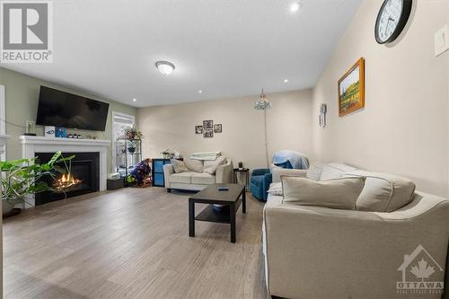 240 Par-La-Ville Circle, Ottawa, ON - Indoor Photo Showing Living Room With Fireplace