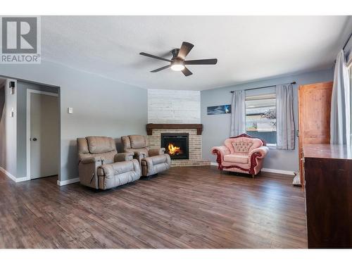 1290 Kilwinning Street, Penticton, BC - Indoor Photo Showing Living Room With Fireplace