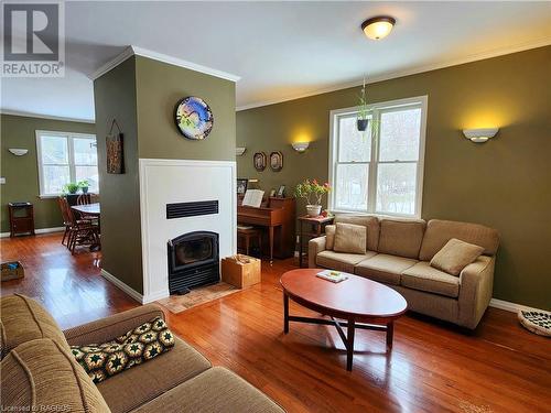 234 Shadywood Crescent, Point Clark, ON - Indoor Photo Showing Living Room With Fireplace