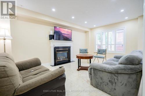 11 Briardale Road, Brampton, ON - Indoor Photo Showing Living Room With Fireplace