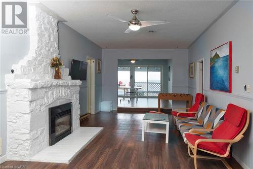 629 Lakelands Avenue, Innisfil, ON - Indoor Photo Showing Living Room With Fireplace