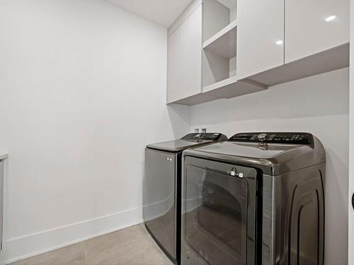 Salle de lavage - 48 Rue Lookout, Morin-Heights, QC - Indoor Photo Showing Laundry Room