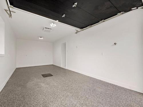 Garage - 48 Rue Lookout, Morin-Heights, QC - Indoor Photo Showing Other Room
