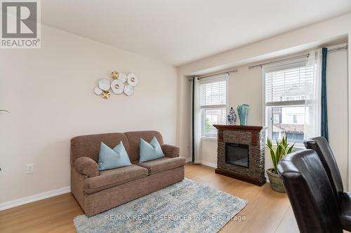 39 Vanhorne Close, Brampton, ON - Indoor Photo Showing Living Room With Fireplace