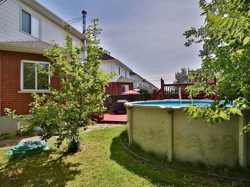 Cour - 5306 Rue Pascal, Longueuil (Saint-Hubert), QC - Outdoor With Above Ground Pool