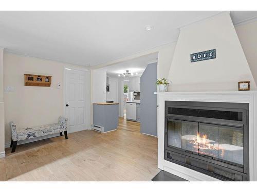 Living room - 1770 Ch. David, Prévost, QC - Indoor Photo Showing Living Room With Fireplace