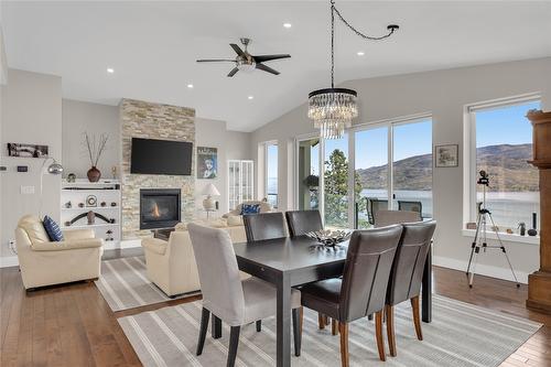 6372 Topham Place, Peachland, BC - Indoor Photo Showing Dining Room With Fireplace