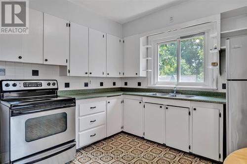 647 Charlotte Street, Peterborough (Monaghan), ON - Indoor Photo Showing Kitchen With Double Sink