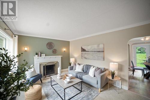 75 Riverside Drive S, Oshawa, ON - Indoor Photo Showing Living Room With Fireplace