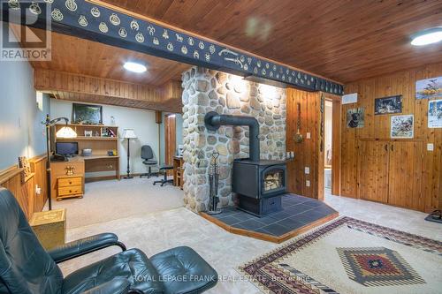 497 Mooney Road, Hastings Highlands, ON - Indoor With Fireplace