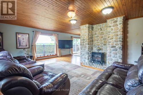 497 Mooney Road, Hastings Highlands, ON - Indoor Photo Showing Living Room With Fireplace