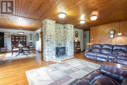 497 Mooney Road, Hastings Highlands, ON - Indoor Photo Showing Living Room With Fireplace