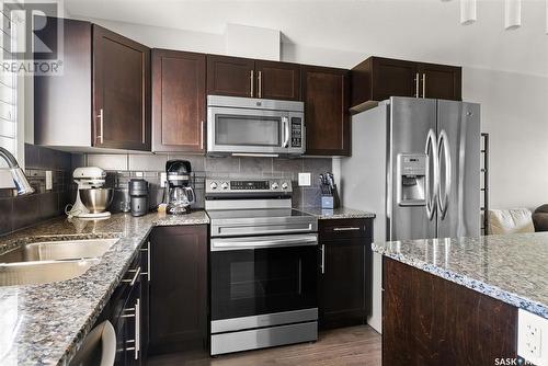 5145 Beacon Way, Regina, SK - Indoor Photo Showing Kitchen With Double Sink With Upgraded Kitchen