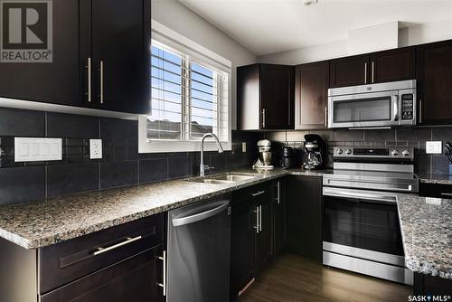 5145 Beacon Way, Regina, SK - Indoor Photo Showing Kitchen With Double Sink