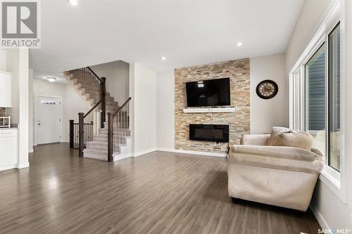4044 Waterer Street, Regina, SK - Indoor Photo Showing Living Room With Fireplace