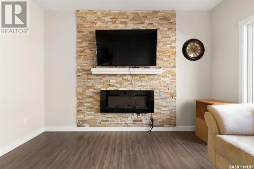 4044 Waterer Street, Regina, SK - Indoor Photo Showing Living Room With Fireplace