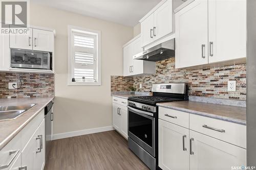 4044 Waterer Street, Regina, SK - Indoor Photo Showing Kitchen With Double Sink With Upgraded Kitchen