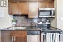 903 320 5Th Avenue N, Saskatoon, SK  - Indoor Photo Showing Kitchen With Double Sink 