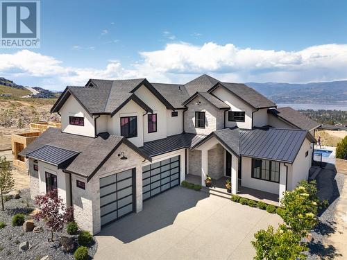 1440 Hill Spring Place, Kelowna, BC - Outdoor With Facade