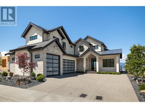 1440 Hill Spring Place, Kelowna, BC - Outdoor With Facade