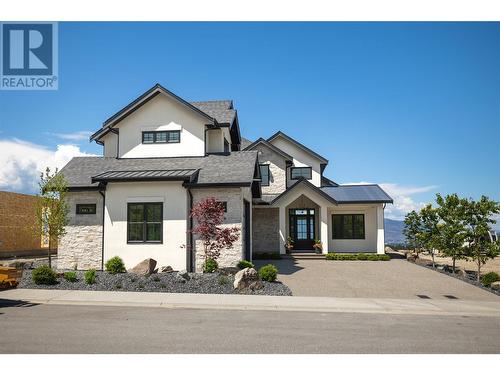 1440 Hill Spring Place, Kelowna, BC - Outdoor With Facade