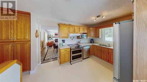 10 Marquis Crescent, Regina, SK - Indoor Photo Showing Kitchen With Double Sink