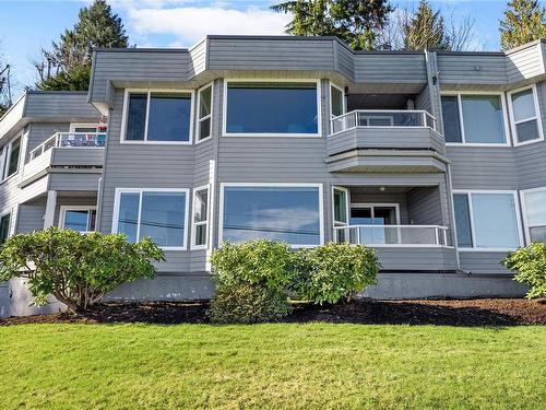 102-3132 Island Hwy West, Qualicum Beach, BC - Outdoor With Balcony With Facade