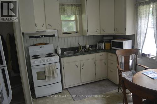 66 Chemaushgon Road, Bancroft, ON - Indoor Photo Showing Kitchen With Double Sink