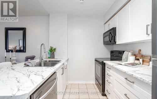 109 - 90 Aspen Springs Drive, Clarington, ON - Indoor Photo Showing Kitchen With Double Sink