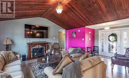 14 Church Road, Pilley'S Island, NL - Indoor Photo Showing Living Room With Fireplace